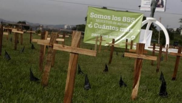 Crosses are left as a protest against the high homicide rate in the country in San Salvador, El Salvador Sept. 1, 2015. El Salvador is still struggling to break the legacy of civil war violence.