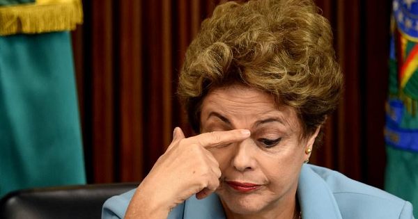 Brazilian President Dilma Rousseff gestures during a meeting with governors to discuss a way to combat the Zika virus at Planalto Palace in Brasilia, on Dec. 8, 2015.