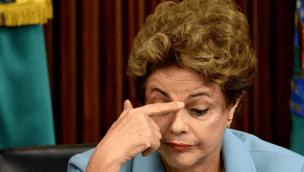 Brazilian President Dilma Rousseff gestures during a meeting with governors to discuss a way to combat the Zika virus at Planalto Palace in Brasilia, on Dec. 8, 2015. 