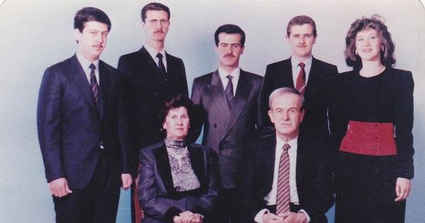 Former Syrian President Hafez Assad and his wife Aniseh sit in front of their sons (left to right) Maher, Bashar, Bassel and Majd, and daughter Bushra.