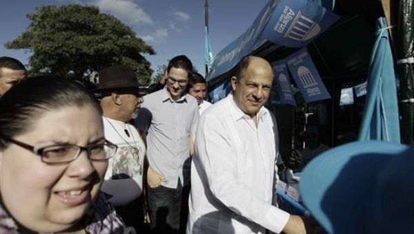 Costa Rica's President Luis Guillermo Solis enters his polling station during municipal elections, San Jose, Costa Rica  Feb. 7, 2016.