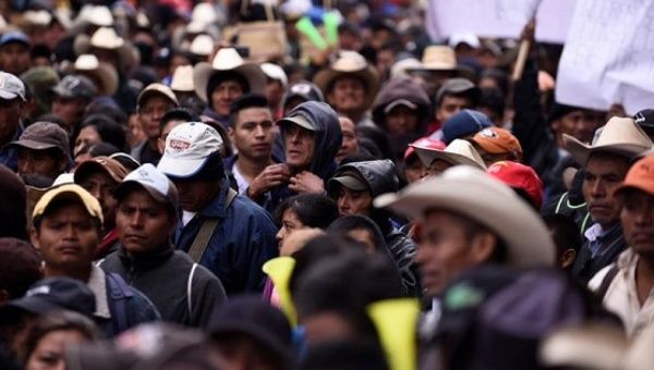 Thousands of campesinos marched in Guatemala city to demand President Jimmy Morales make reforms, Feb. 10, 2016.