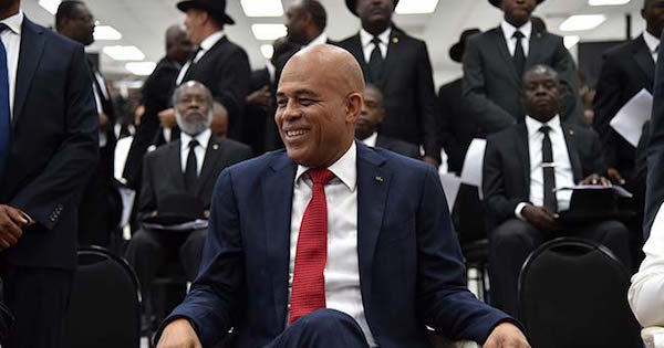 Michel Martelly was able to leave office thanks to a last-minute agreement hours before to install a transitional government after prolonged protests that sometimes turned violent.