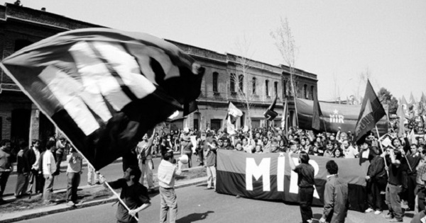 Supporters of the Movement of the Revolutionary Left, known as the MIR, wave the flag of the organization in an undated photo.
