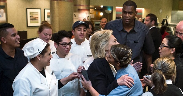 Presidential candidate Hillary Clinton arrives at the Aria greets workers before speaking at the NALEO conference in Las Vegas.