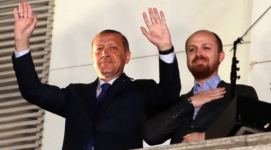 Turkish President Tayyip Erdogan (L), accompanied by his son Bilal.