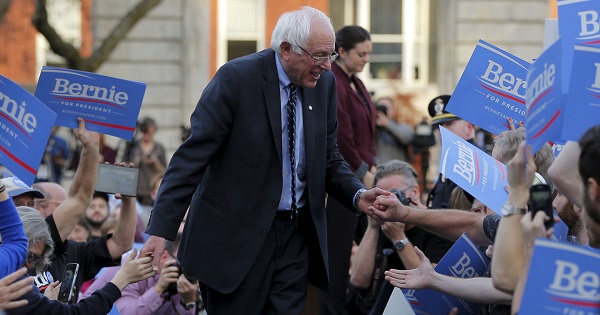 Senator Bernie Sanders greets supporters at a campaign rally outside the New Hampshire State House on Nov. 5, 2015.