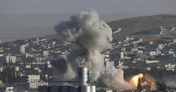 Smoke rises after an U.S.-led airstrike in the Syrian town of Kobani Oct. 10, 2014.