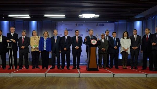 Representatives of all but one political party with representation in the Congress join President Juan Manuel Santos to declare their support for the peace process, Bogota, Colombia, Feb. 23, 2016. 