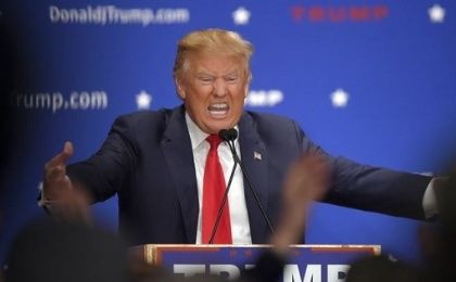 Donald Trump addresses the crowd at a campaign rally in Farmington, New Hampshire. 