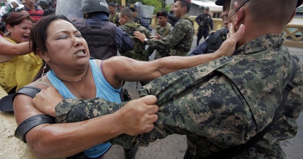 Police in Honduras repress women protesting violence against women.