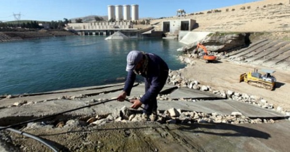Employees work at strengthening the Mosul Dam in northern Iraq, Feb. 3, 2016.