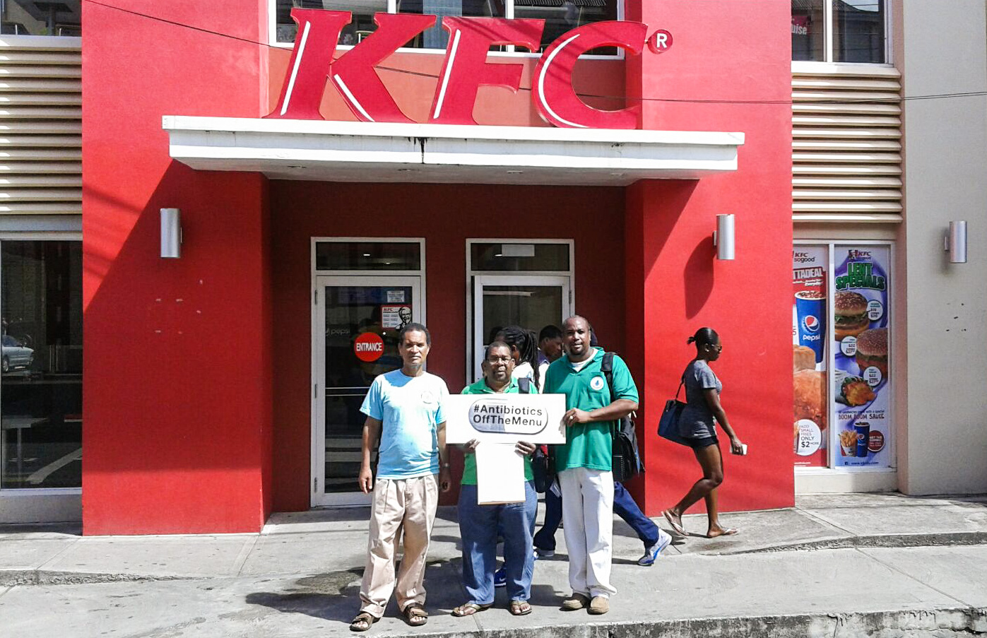 Members of the Executive of the National Consumers Association after delivering their petition to a fast food outlet in Castries, Saint Lucia.