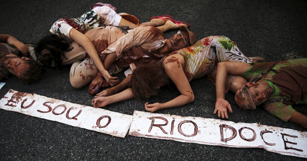 Activists protest the Samarco mine environmental disaster.