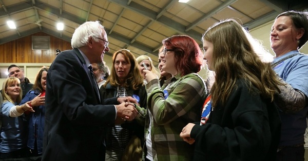 Bernie Sanders shakes hands with potential supporters after speaking at a campaign town hall meeting at Pinkerton Academy in Derry, New Hampshire.
