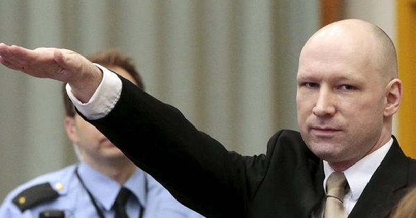 Terrorist Anders Behring Breivik raises his arm in a Nazi salute as he enters the court room in Skien prison, Norway, March 15, 2016.
