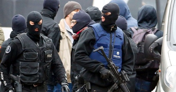 Brussels Police have launched a massive manhunt for at least two terrorist suspects who apparently shot at security forces, allegedly injuring three officers.