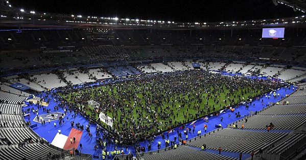 Soccer fans evacuated onto the Stad de France pitch during the November terror attacks in Paris.