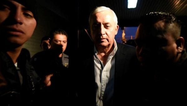 Former Guatemalan President Otto Perez Molina arrives in court in Guatemala City to face trial for corruption, March 28, 2016.