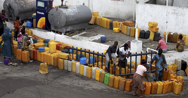 Plastic containers are arranged at a fuel station as people wait to buy kerosene in Nigeria's commercial capital Lagos.