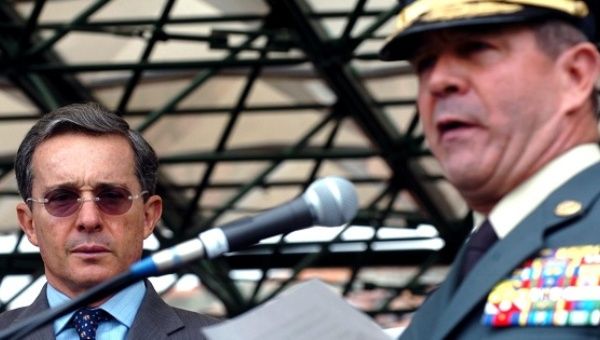 Former Colombian President Uribe and retired Army General Montoya, who is under investigation for his role in the false positives scandal, Bogota, Aug. 9, 2006.
