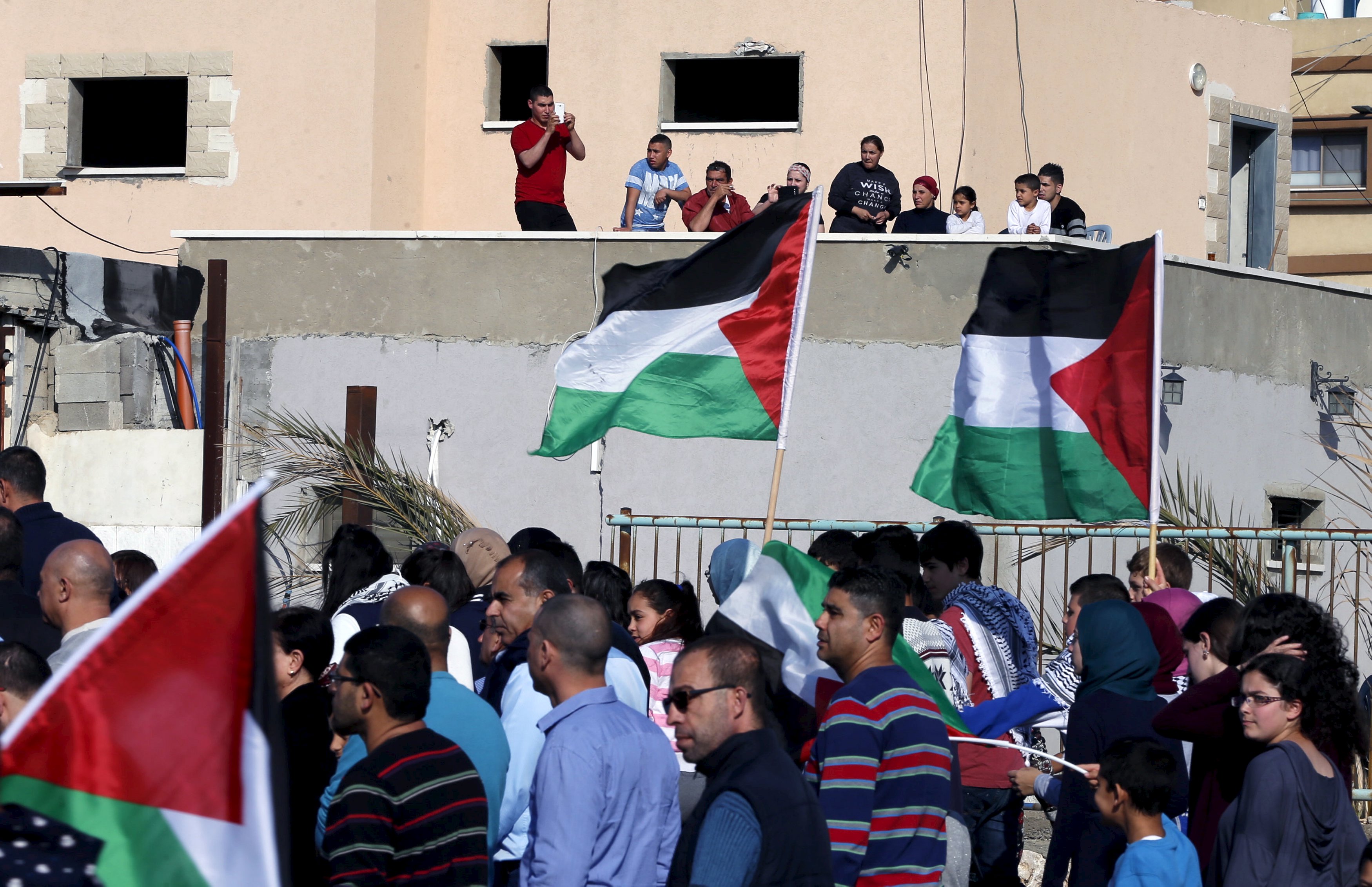 Palestinian demonstrators take part in a Land Day rally in the northern Israeli village of Arrabe, March 30, 2016