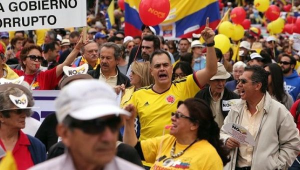 Colombians march against peace with the FARC in Bogota on April, 2, 2016.