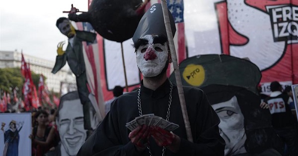 A demonstrator protests outside Congress in Buenos Aires, March 24, 2016.