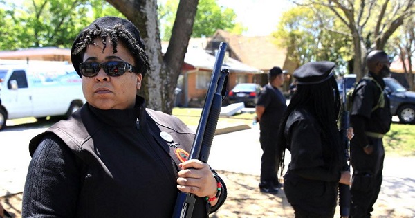 Armed with a shotgun, Krystal Muhammad stood guard with other members of the New Black Panther Party outside a mosque, South Dallas.