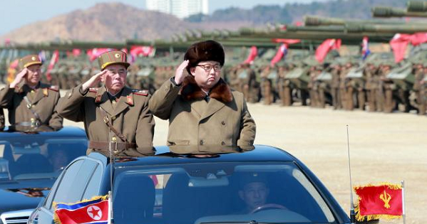 North Korean leader Kim Jong Un salutes as he arrives to inspect a military drill, released by North Korea's Korean Central News Agency (KCNA) on March 25, 2016.