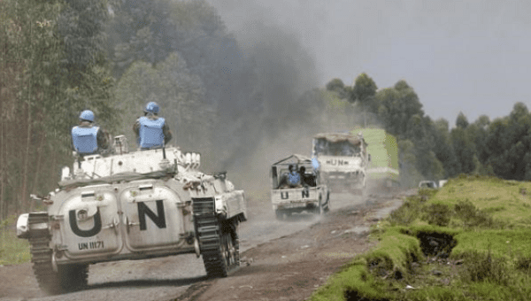 U.N. peacekeepers drive their tank as they patrol past the deserted Kibati village near Goma in the eastern Democratic Republic of Congo, Aug. 7, 2013.