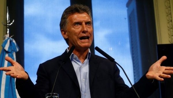 Argentine President Mauricio Macri gestures during a news conference at the Casa Rosada Government House in Buenos Aires, Argentina February 22, 2016.