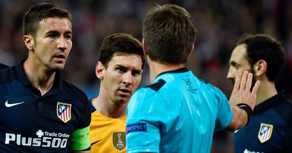 Atletico Madrid's midfielder Gabi (L) and Barcelona's Argentinian forward Lionel Messi look at Italian referee Nicola Rizzoli (2nd R) April 13, 2016.