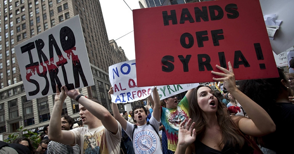 Demonstrators protest against proposed U.S. military action against Syria in Times Square in New York in 2013.