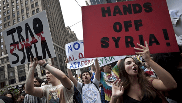 Demonstrators protest against proposed U.S. military action against Syria in Times Square in New York in 2013. 