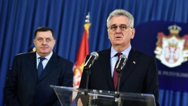 Serbian President Tomislav Nikolic (right) addresses a press conference in Belgrade, on Feb. 3, 2014. 