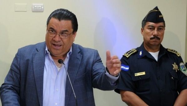 Honduran Minister of Security, Arturo Corrales, answers questions from the press in Tegucigalpa on December 9, 2014