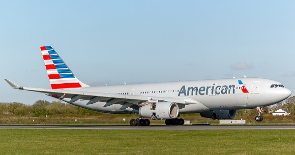 An American Eagle airline flight lands.