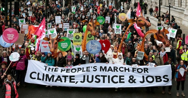 Protesters rally in London on Nov. 29, ahead of the COP21 summit in Paris.
