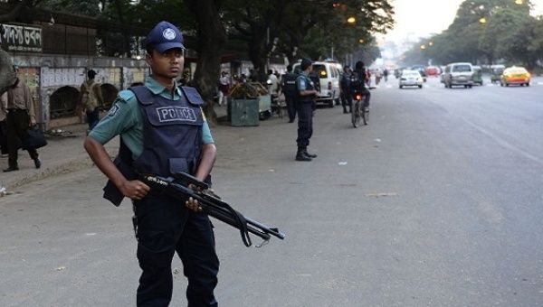 Bangladeshi police are seen standing guard in Dhaka.
