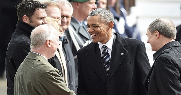 U.S. President Barack Obama is greeted by Deputy Chief of Mission at the U.S. Embassy in Berlin, Kent Logsdon after his arrival to Hanover airport, Germany April 24, 2016.