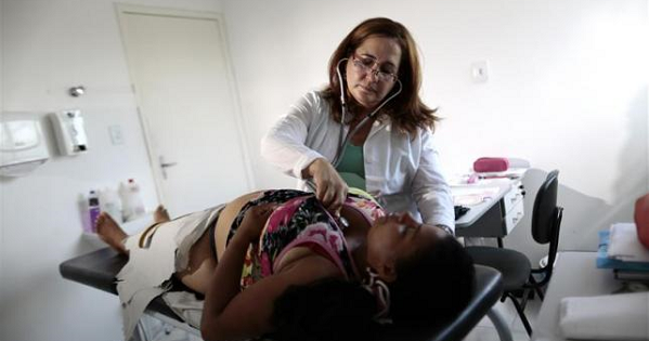 Cuban doctor Elza Vega Rodriguez inspects a pregnant patient at the Health Center in the city of Piaus in the state of Bahia, north-eastern Brazil Nov. 20, 2013.