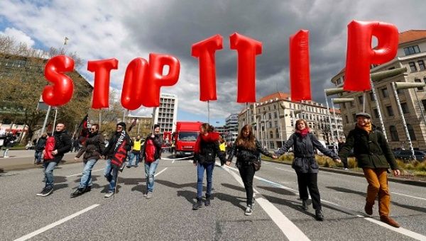 Protesters demonstrate against the TTIP free trade agreement ahead of Barack Obama's visit in Hanover.