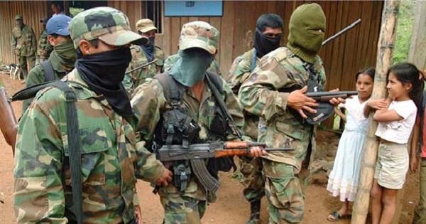 Paramilitaries kill, rape and torture Colombian campesinos.