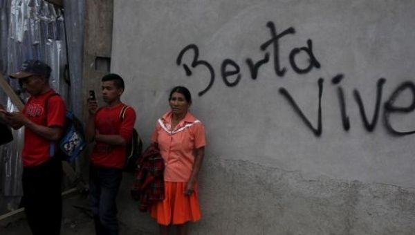 Supporters of Berta Caceres during her funeral in the town of La Esperanza, Honduras. Sign reads, 'Berta Lives', March 5, 2016. 