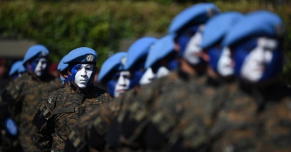 Guatemalan soldiers listen to a speech by President Jimmy Morales during a ceremony at Campo Marte in Guatemala City, on Jan. 15, 2016.