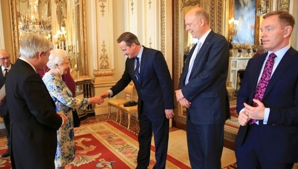Prime Minister Cameron greets Queen Elizabeth at Buckingham Palace, May 10, 2016.