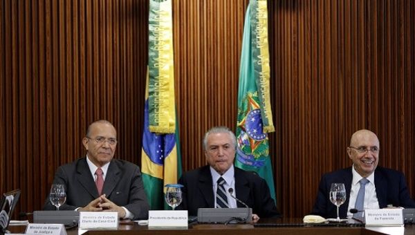 Brazil's Chief of Staff Minister Eliseu Padilha, Senate-imposed President Michel Temer, and Finance Minister Henrique Meirelles (L-R) in Brasilia, Brazil, May 13, 2016. 