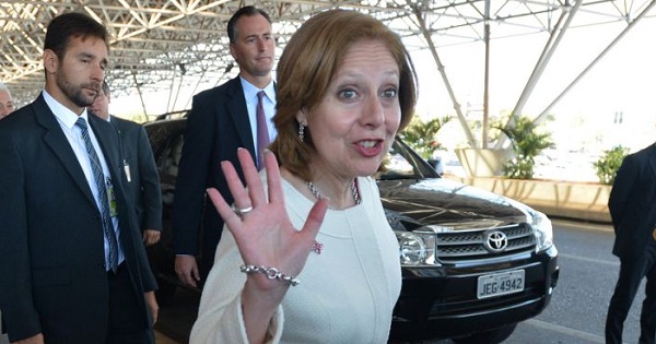 U.S. Ambassador to Brazil Liliana Ayalde waves at the Brasilia International airport, upon her arrival, Sept. 16, 2013.