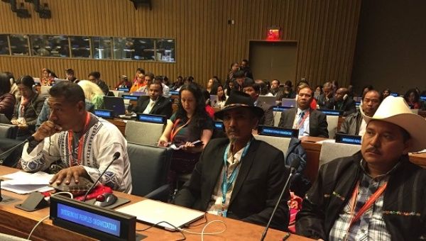 Antonio Tizapa (L), father of one of the 43 forcibly disappeared Mexican students, waits to address the  U.N. Permanent Forum on Indigenous Issues.